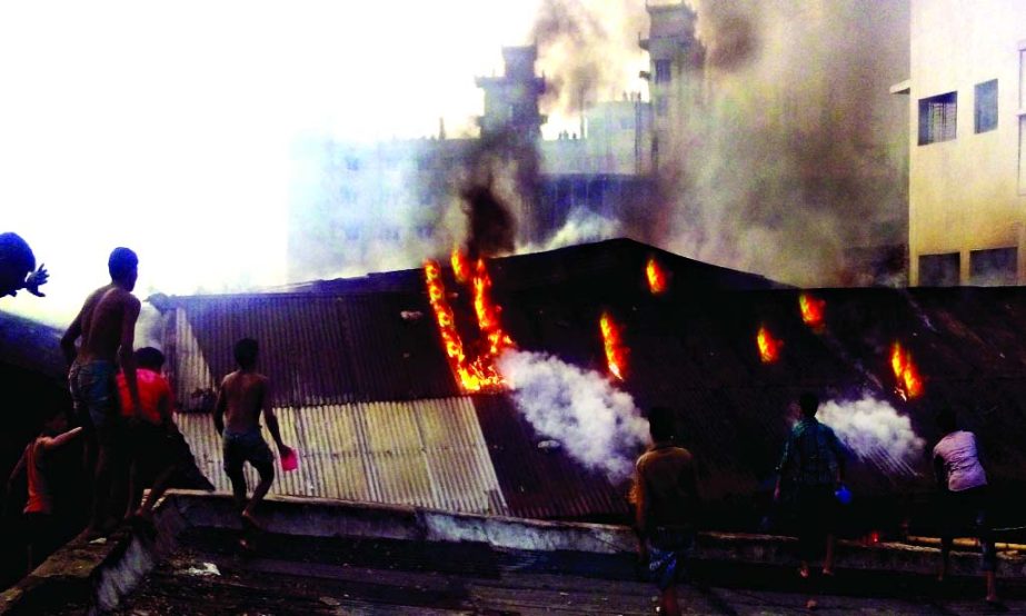 A fire broke out at book binding factory at Farashganj in city's Sutrapur area on Monday. Many houses also being ablaze.