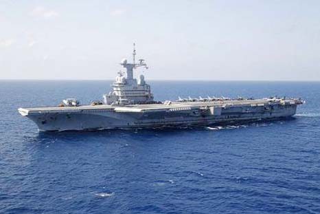 France's flagship Charles de Gaulle aircraft carrier makes it way through the Mediterranean Sea