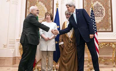 US Secretary of State, John Kerry, shaking hands with his Iranian counterpart Mohammad Javad Zarif..