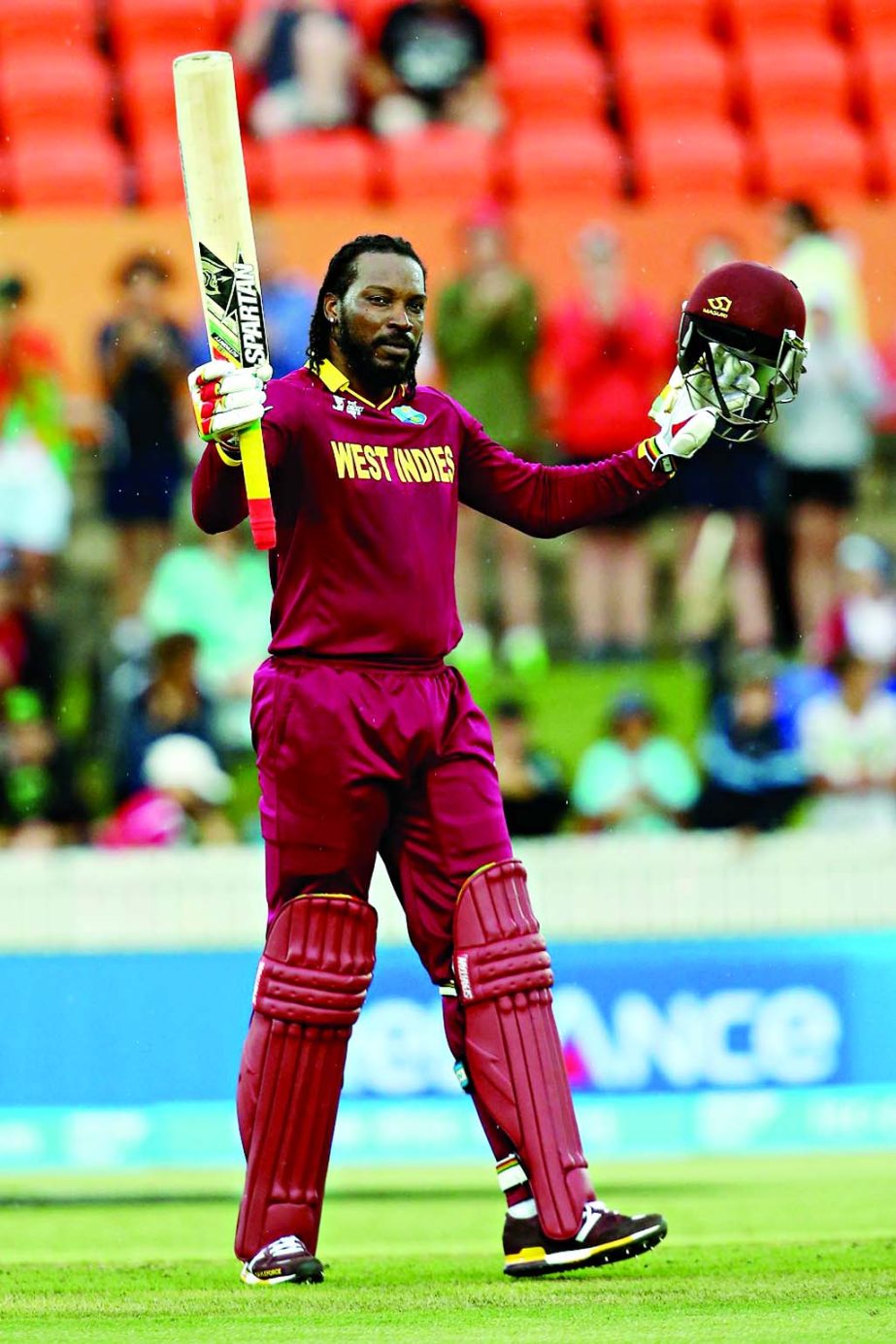 Chris Gayle soaks in the applause after scoring double century during the 2015 ICC Cricket World Cup match between the West Indies and Zimbabwe at Manuka Oval in Canberra, Australia on Tuesday.