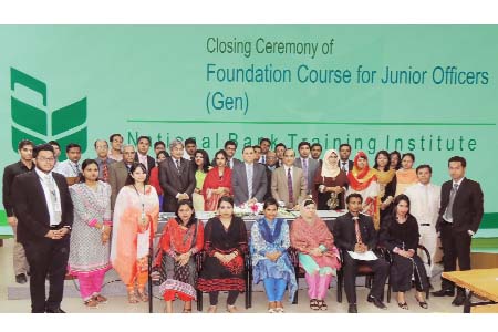 Shamsul Huda Khah, Managing Director & CEO of National Bank Limited, poses with the participants of a foundation training course at the bank's training institute recently.
