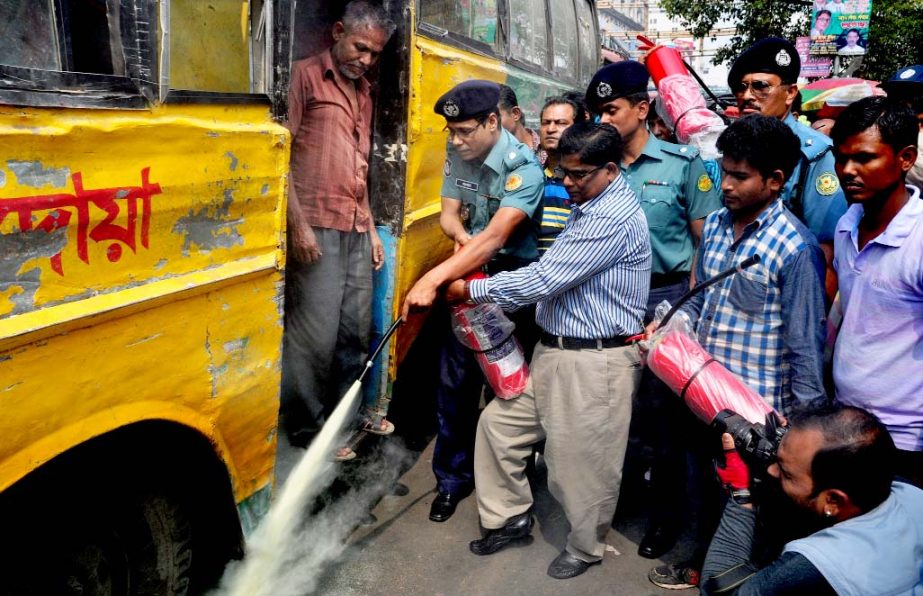 DC of Motijheel Zone of Dhaka Metropolitan Police Anwar Hossain distributed gas cylinder to each vehicle for extinguishing fire in arson attacks after a training session. The snap was taken from the city's Gulistan area on Wednesday.