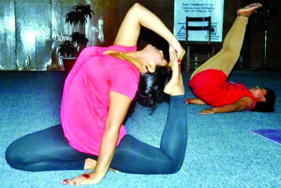 A participant of the Marcel Television 2nd National Yoga Competition performs at the conference room of National Sports Council on Thursday.