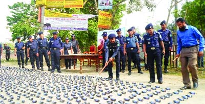 SIRAJGANJ: Police in Sirajganj destroying phensidyl and ganja recovered in different drives on Thursday.