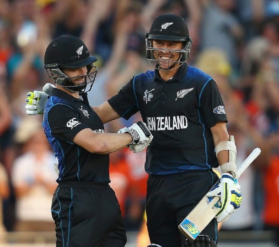 Kane Williamson is embraced by Trent Boult after sealing the nervy chase with a six during the 2015 ICC Cricket World Cup match between Australia and New Zealand at Eden Park on Saturday in Auckland, New Zealand.
