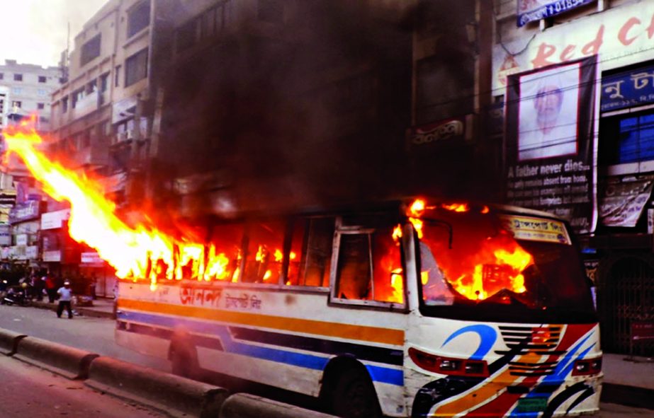 A passenger bus was torched by pro-hartal activists at Chashara in N'ganj on Saturday.