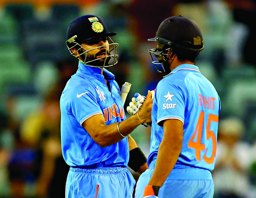 Rohit Sharma (right) and Virat Kohli's 75-run partnership saw India through to a nine-wicket win over United Arab Emirates during their World Cup 2015, Group B match in Perth on Saturday. Photo: Agency