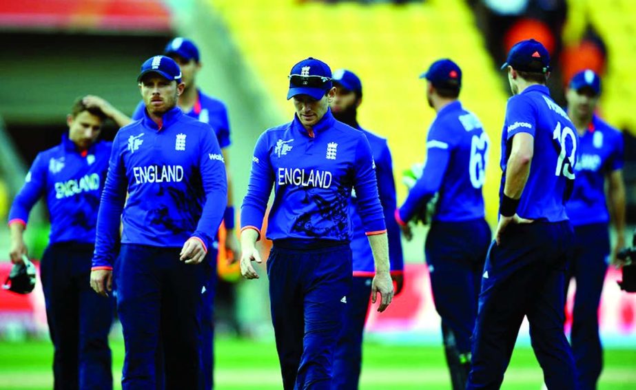 England trudge off the field after losing by nine wickets against Sri Lanka, during the 2015 ICC Cricket World Cup match at Wellington Regional Stadium in Wellington, New Zealand on Sunday.