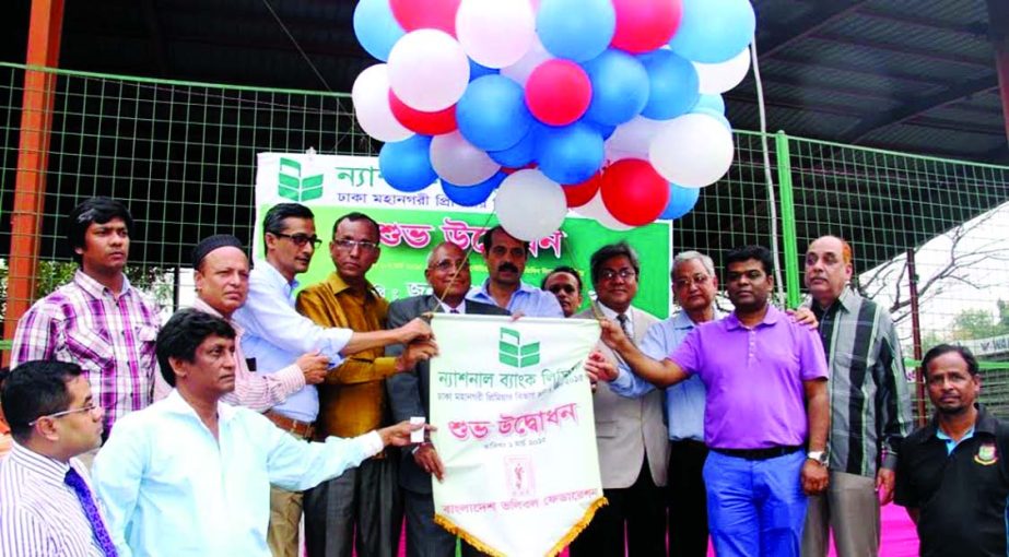 Deputy Managing Director of National Bank Limited Syed Md Barikullah inaugurating the National Bank Limited Dhaka Metropolis Premier Division Volleyball League by releasing the balloons as the chief guest at the Dhaka Volleyball Stadium on Sunday.
