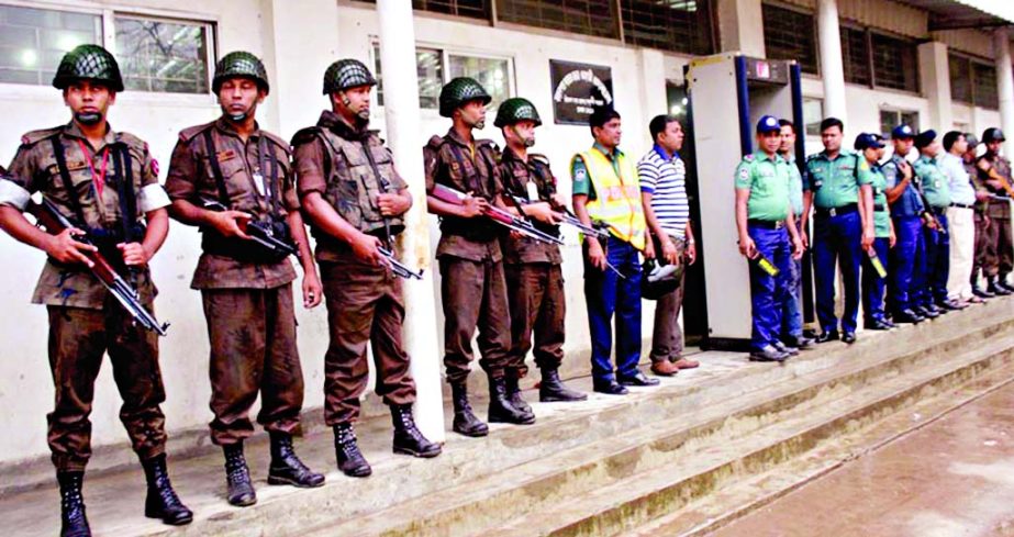 Security forces cordon the special court set up for BNP Chairperson Begum Khaleda Zia in city's Bakshibazar's Alia Madrasah ground for security reason on Wednesday.