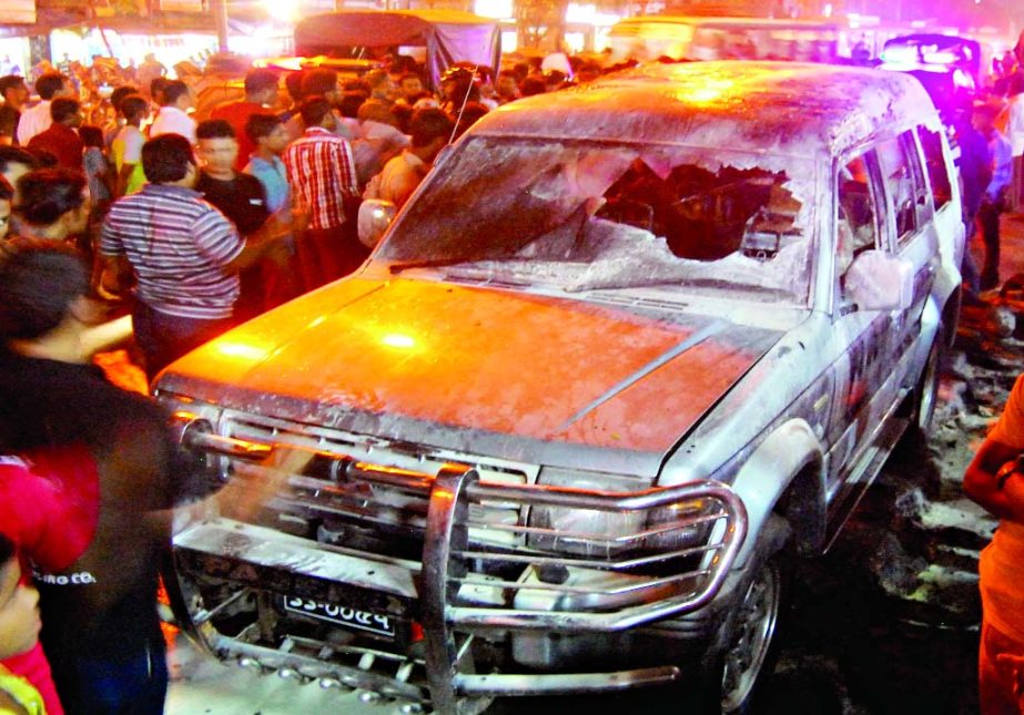 Pro-hartal activists vandalised and torched the private car in city's Golapbag area on Wednesday.