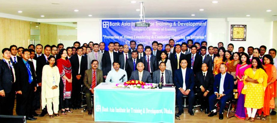 Aminul Islam, Additional Managing Director and Chief Operating Officer of Bank Asia, poses with the participants of a training course on "Prevention of Money Laundering & Combating Financing on Terrorism" at the bank's Institute in the city recently. M