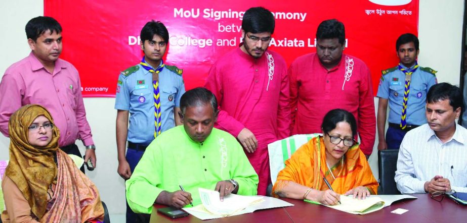 Prof Tuhin Afroza Alam, Principal of Dhaka College and Mahtab Uddin Ahmed, COO of Robi Axiata Limited sign an agreement recently at the college premises to provide dynamic Web-site and an automation tool to digitalize its education system.