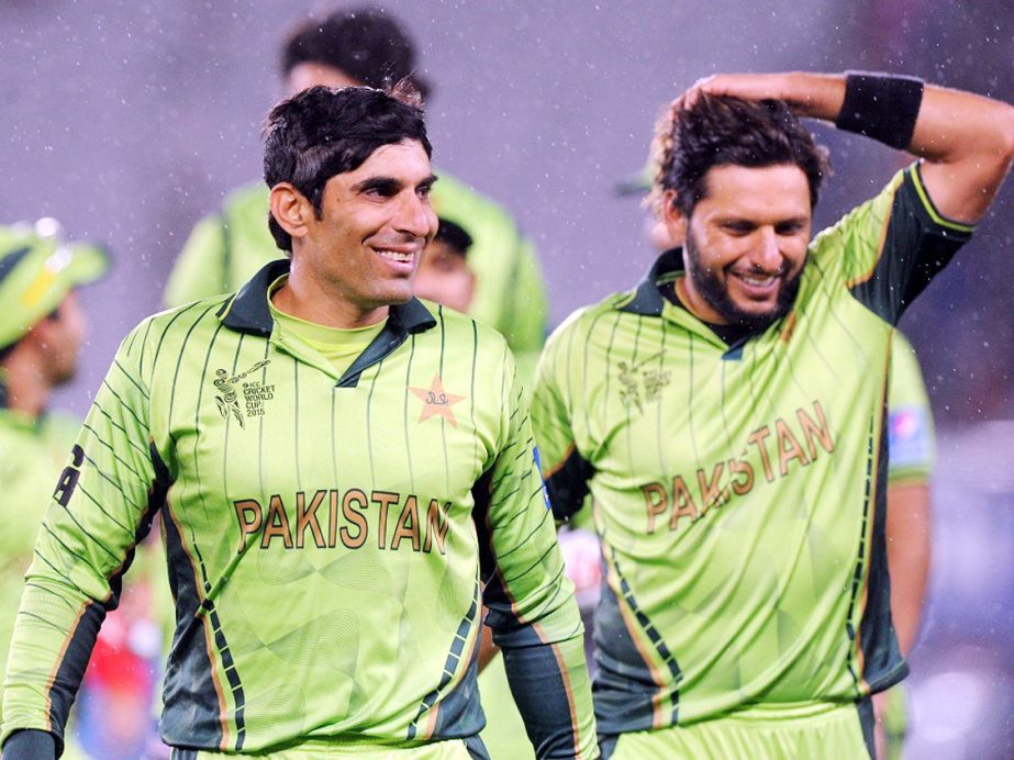 Pakistan's captain Misbah Ul Haq (left) and teammate Shahid Afridi smile as they leave the field after their 29 run win over South Africa in their Cricket World Cup Pool B match in Auckland, New Zealand on Saturday.