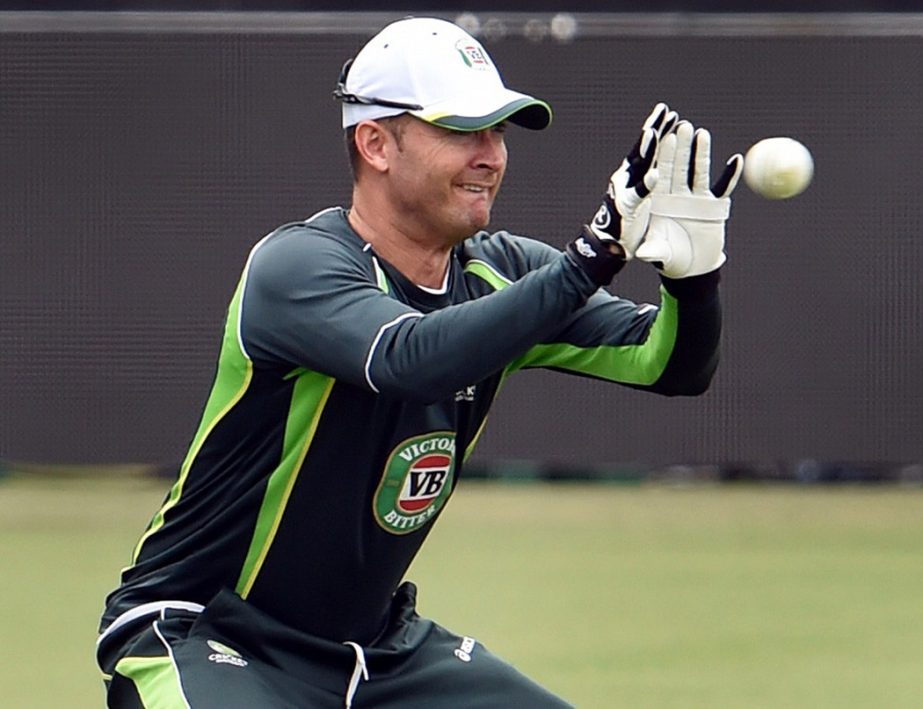 Australian captain Michael Clarke takes a catch as the team trains ahead of their 2015 Cricket World Cup Group A match against Sri Lanka in Sydney on Saturday.