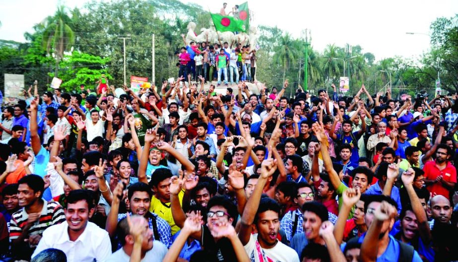 Cricket fans celebrate in the city streets after Bangladesh reach the quarter-finals of the ICC World Cup Cricket 2015 beating England in their Pool A match at Adelaide in Australia on Monday. This picture was taken from TSC premises in Dhaka University.