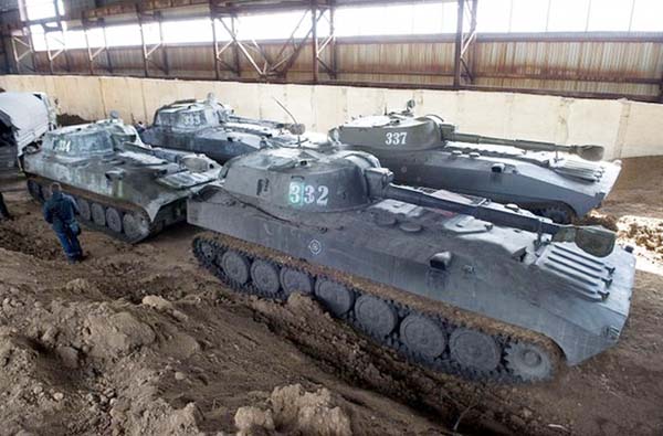 Self-propelled guns of the self-proclaimed People's Republic of Donetsk stood parked in a hangar in Snizhne, some 90km (56 miles) east of Donetsk, on Saturday.