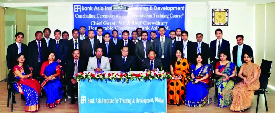 A Rouf Chowdhury, Chairman of Bank Asia, poses with the participants of a 'Foundation Training Course' after handing over certificates at the concluding day at its Institute in the city recently.