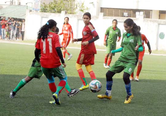 Members of Bangladesh Under-14 Girls' preliminary squad during their practice session at the BFF Artificial Turf on Wednesday.