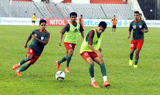 Players of Bangladesh Under-23 Football team taking part at their practice session at the Bangabandhu National Stadium on Wednesday.