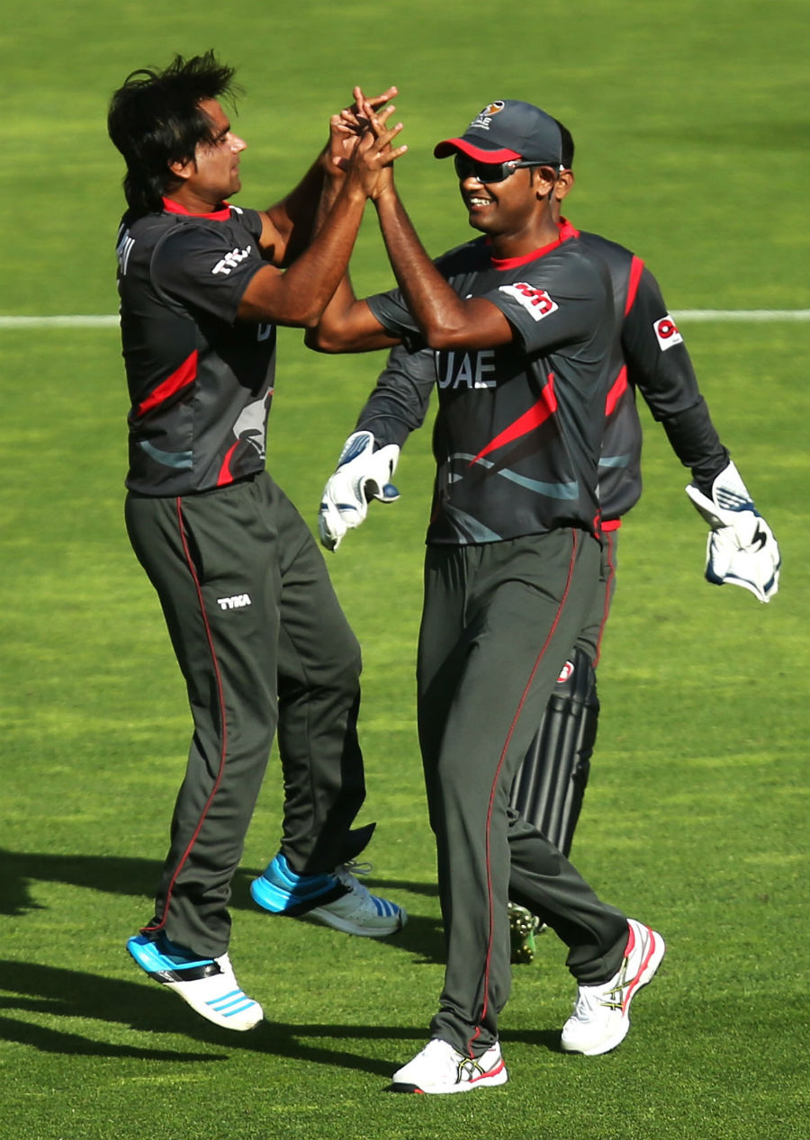 Kamran Shazad is congratulated after he dismissed AB de Villiers during the World Cup 2015 Group B between South Africa and United Arab Emirates in Wellington on Thursday.