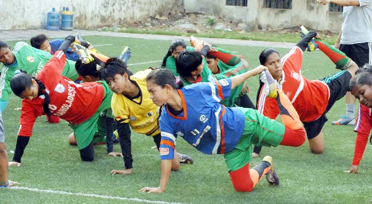 Members of Bangladesh Under-14 Girls' team during their practice session at the BFF Artificial Turf on Thursday.