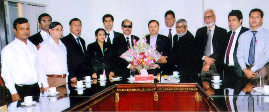 Newly elected members of Chittagong Tax Lawyers' Association greeting Mahbubul Alam, President, Ctg Chamber of Commerce and Industry in Ctg recently.