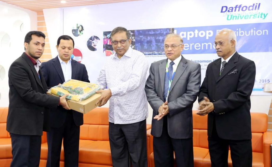 State Minister for Home Affairs Asaduzzaman Khan, MP distributing laptops among the students of Daffodil International University at a program in the university recently.