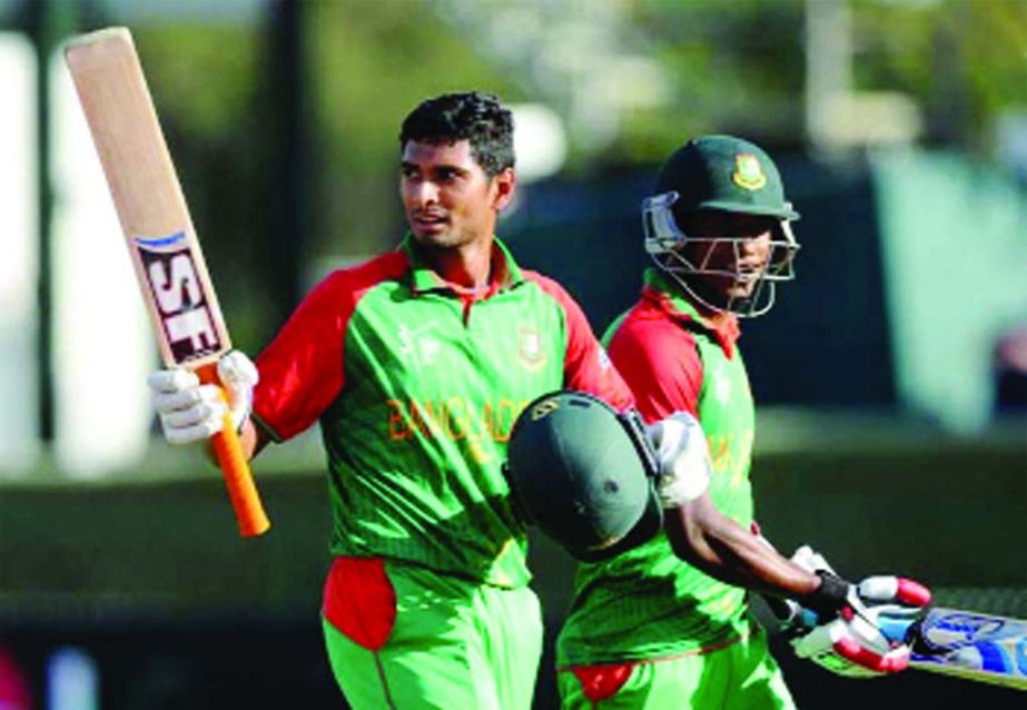 Bangladeshâ€™s Mahmudullah, (left) waves his bat as he leaves the field with teammate Rubel Hossain during their Cricket World Cup Pool A match against New Zealand in Hamilton on Friday.