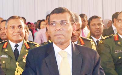 Former Maldives President Mohamed Nasheed seen with high civil and military officials in Male.