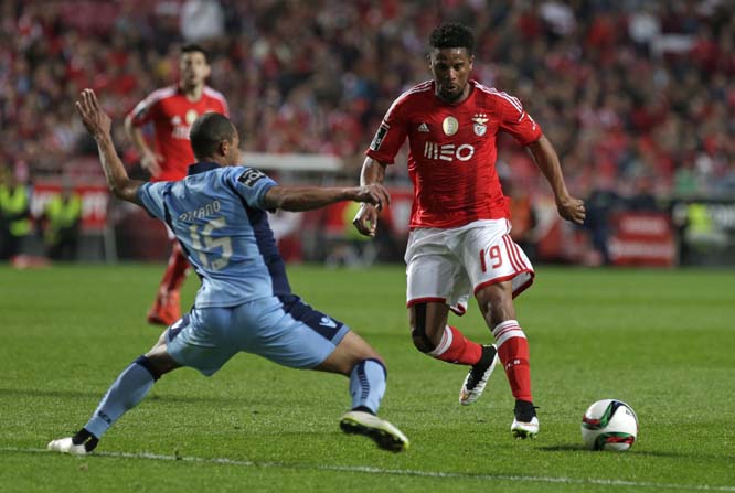 Benfica's Eliseu Santos (right) vies for the ball with Braga's Wanderson "Baiano" Carneiro, from Brazil, during a Portuguese league soccer match between Benfica and Braga at Benfica's Luz stadium in Lisbon on Saturday. Eliseu scored once in Benfica'