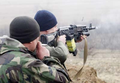 Ukrainian servicemen take part in military exercises near Schastya, in Lugansk region
