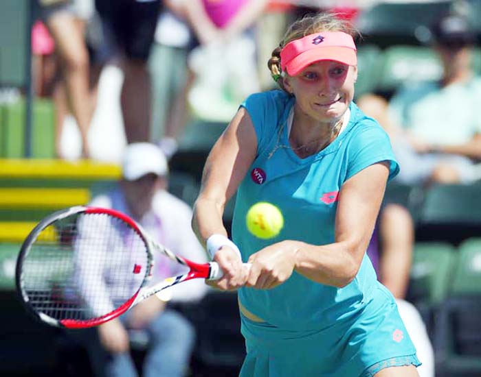 Ekaterina Makarova of Russia returns to Timea Bacsinszky of Switzerland during their match at the BNP Paribas Open tennis tournament in Indian Wells, Calif on Sunday.