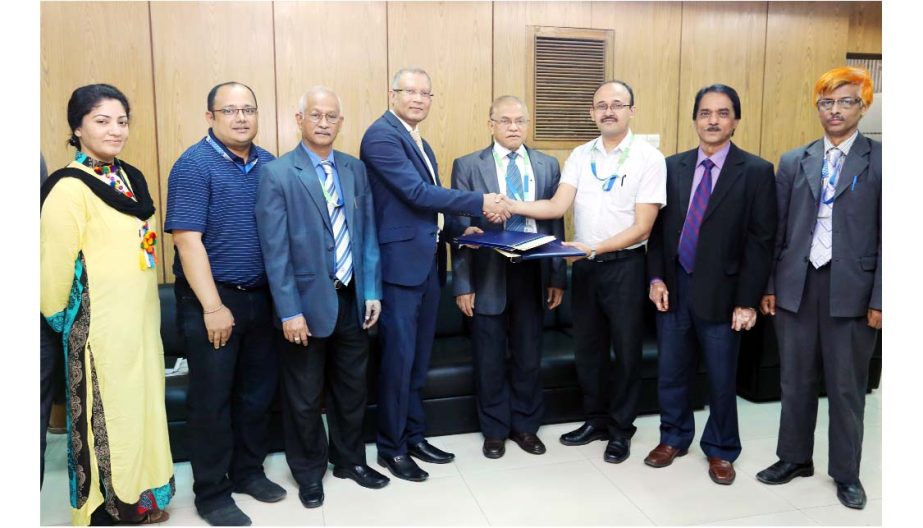 Syed Maruf Reza, Director Career Development Center, Daffodil International University and Nazir Alam, CEO, The FLL, UK are seen in a deal signing program on Saturday at the university VC office.