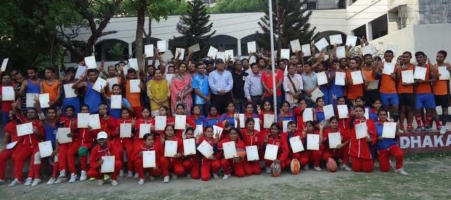 The participants of the rugby trainers and coaches course pose for a photo session at the Physical Education College in Mohammadpur on Monday.