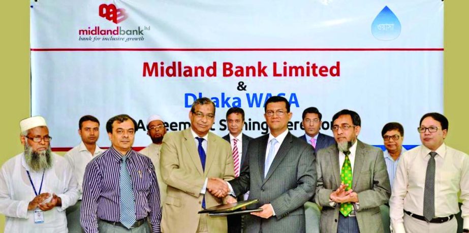 Md Ahsan-uz Zaman, Managing Director & CEO of Midland Bank Limited and Engr Taqsem A Khan, Managing Director of Dhaka WASA sign a Bill Collection agreement at WASA Bhaban in the city recently.
