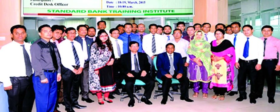 Nazmus Salehin, Managing Director & CEO of Standard Bank Limited poses with the participants of a two-day long workshop on "Credit Appraisal" organized by the Training Institute of the bank recently. Md Zakaria, Principal of the Institute was present.