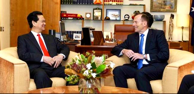 Vietnamese Prime Minister Nguyen Tan Dung, left, with his Australian counterpart Tony Abbott seen at a meeting.