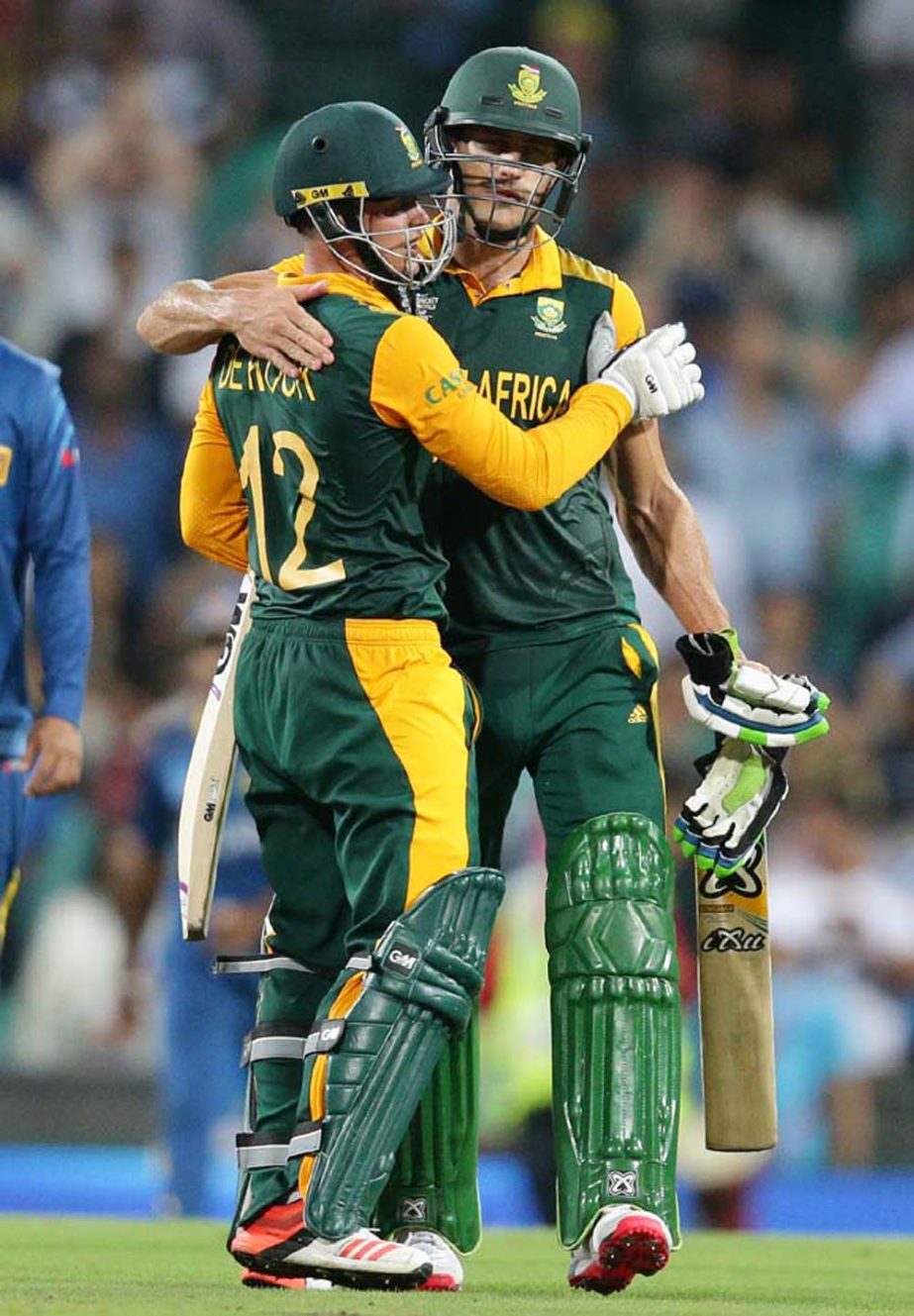 South Africa's Francois Du Plessis (right) and teammate Quinton de Kock celebrate after defeating Sri Lanka by nine wickets to win in their Cricket World Cup quarterfinal match in Sydney, Australia on Wednesday.