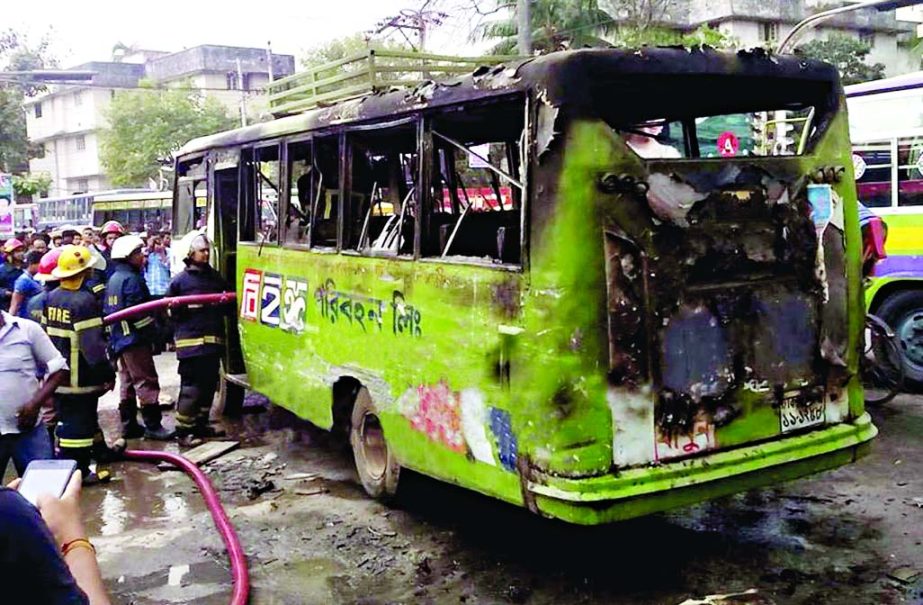 Miscreants torched a passenger bus in city's Nilkhet area on Wednesday.