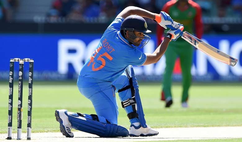 Rohit Sharma drives through the off side, Bangladesh v India, World Cup 2015, 2nd quarter-final, Melbourne, March 19, 2015. Photo: espncricinfo