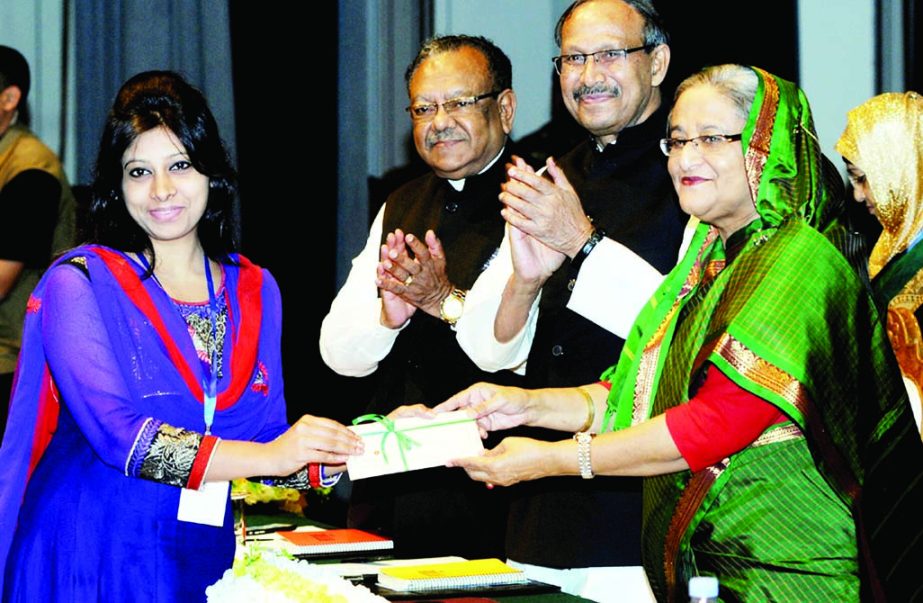 Prime Minister Sheikh Hasina handing over Bangabandhu Fellowship, National Science and Technology Fellowship among the students and government grant among the researchers at a ceremony organized by Science and Technology Ministry at Osmani Memorial Audito