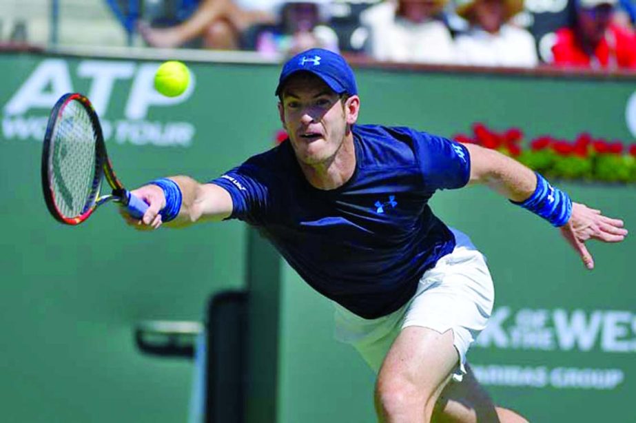 Andy Murray of Great Britain returns a shot to Feliciano Lopez of Spain during their match at the BNP Paribas Open tennis tournament in Indian Wells, Calif onThursday.