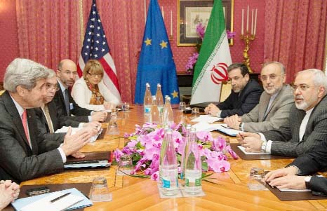 US Secretary of State John Kerry (L) meets with Iran's Foreign Minister Javad Zarif Â® over Tehranâ€™s nuclear programme in Lausanne, Switzerland on Friday..