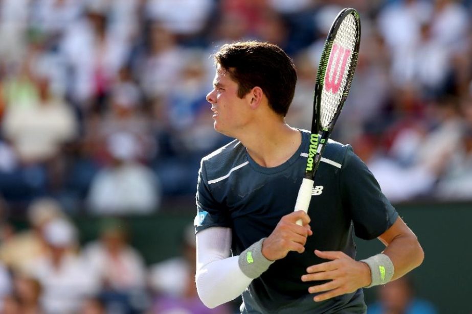 Milos Roanic returns a shot to Rafael Nadal during day twelve of the BNP Paribas Open at the Indian Wells Tennis Garden in California, Indian Wells on Friday.