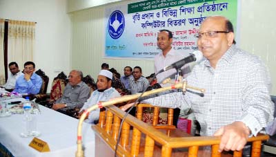 SYLHET: Jamal Uddin Ahmed, Sylhet Divisional Commissioner speaking as Chief Guest at a scholarship distribution programme among the students and computer distributing programme of different educational institutes at Sylhet Zilla Parishad auditorium R