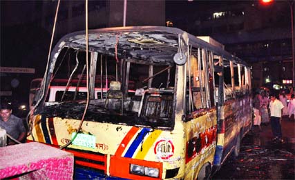 A passenger-bus was set afire by miscreants in front of city's BIRDEM Hospital on Monday evening.