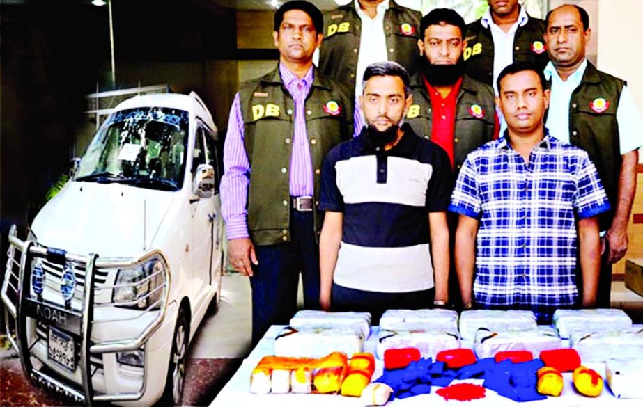 Two drug traders along with one lakh 20 thousand pieces of Yaba tables and a micro-bus were arrested by DB police from city's Demra area on Monday.