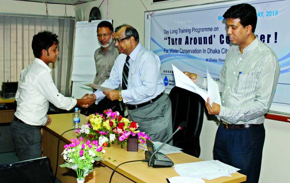 Engr Taqsem A Khan, Managing Director of Dhaka WASA distributing certificates among the participants of a day-long training on "Turn Around Consumer for Water Conservation in Dhaka City" at its Training Centre in the city on Monday. The training was org