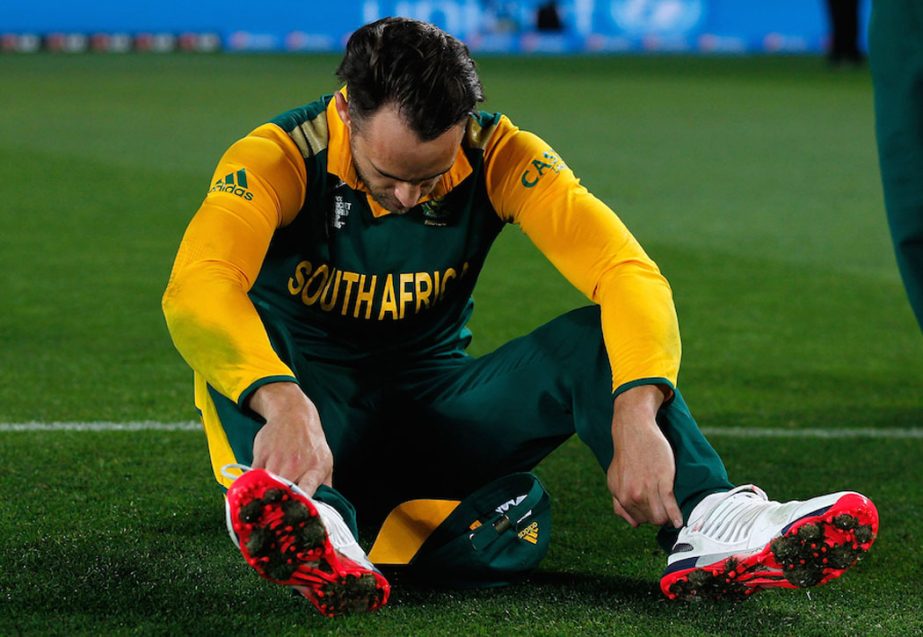 Francois Du Plessis of South Africa sits dejected after losing the 2015 Cricket World Cup semi final match between New Zealand and South Africa at Eden Park in Auckland, New Zealand on Tuesday.